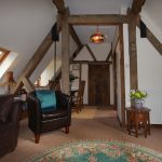Rafters vaulted sitting dining room Cotswold holiday apartment