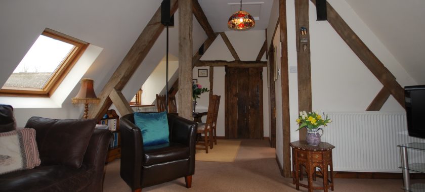 Rafters vaulted sitting dining room Cotswold holiday apartment